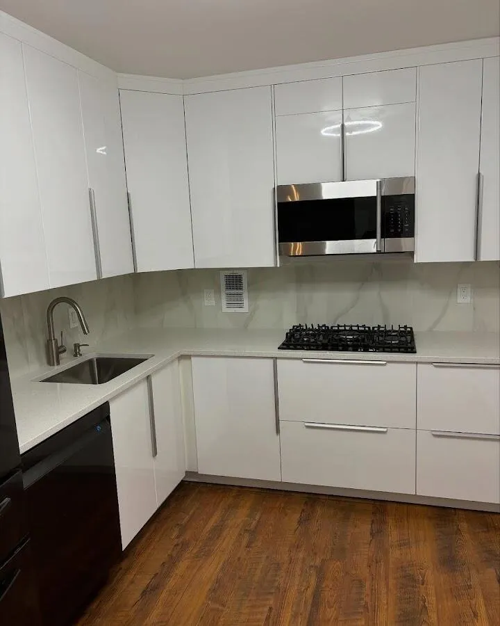 Restored kitchen with white cabinets after water damage in Berkley